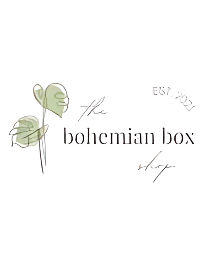 Logo of 'the bohemian box shop' with leaf designs on a white background
