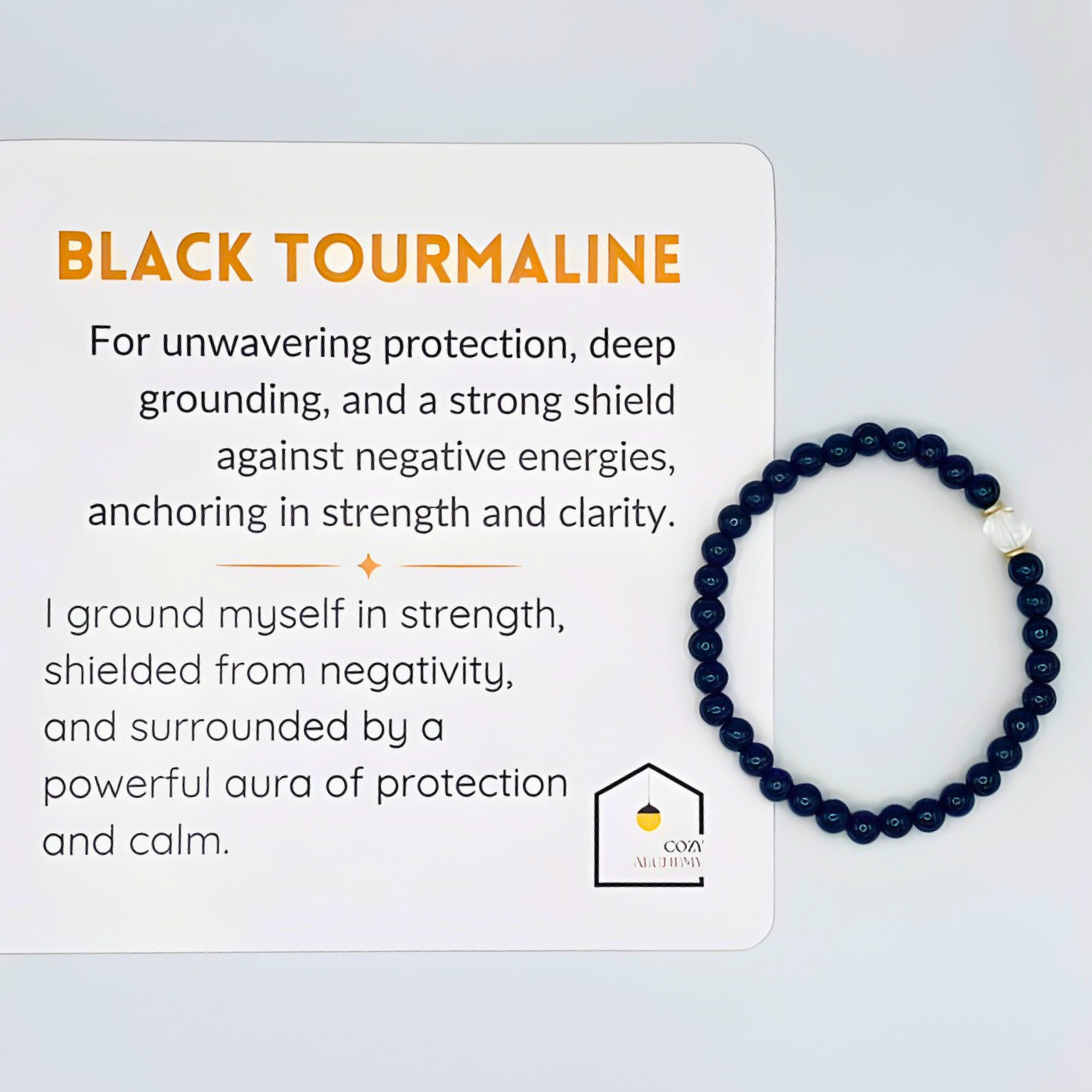 Black tourmaline bracelet with descriptive text on a light gray background