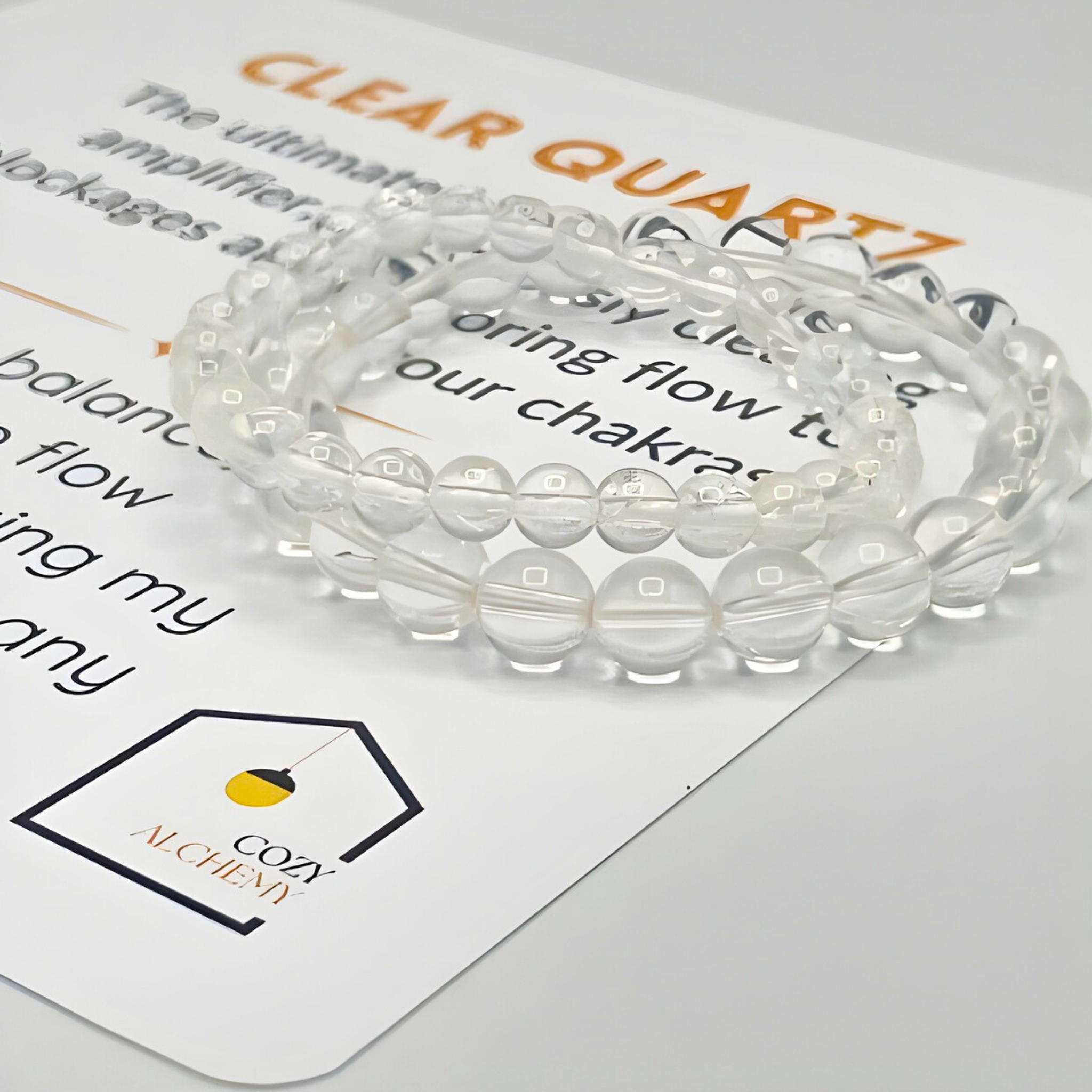 Clear quartz bracelet on a branded card with text and logo