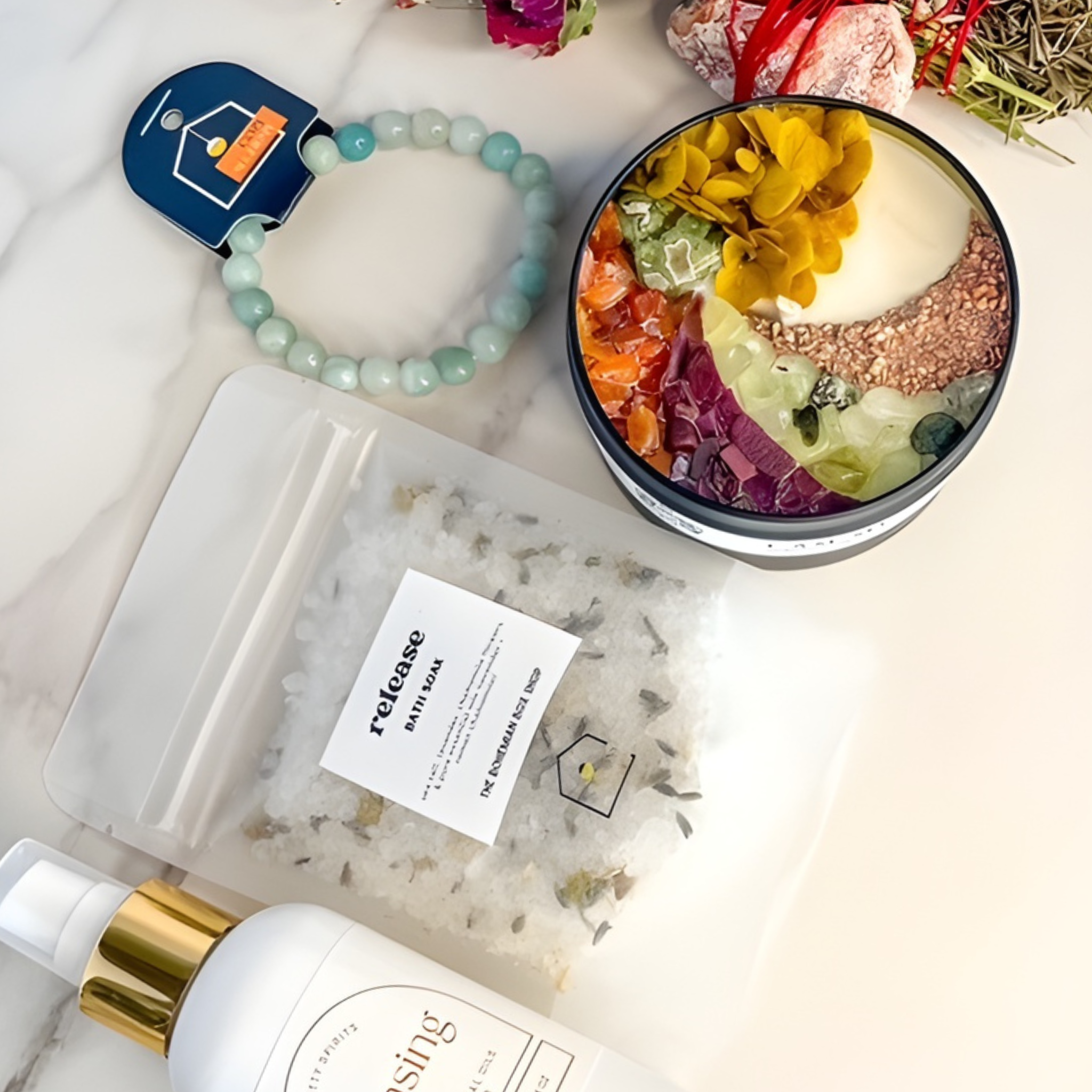 Colorful bowl with fruits and a bottle of lotion on a marble surface