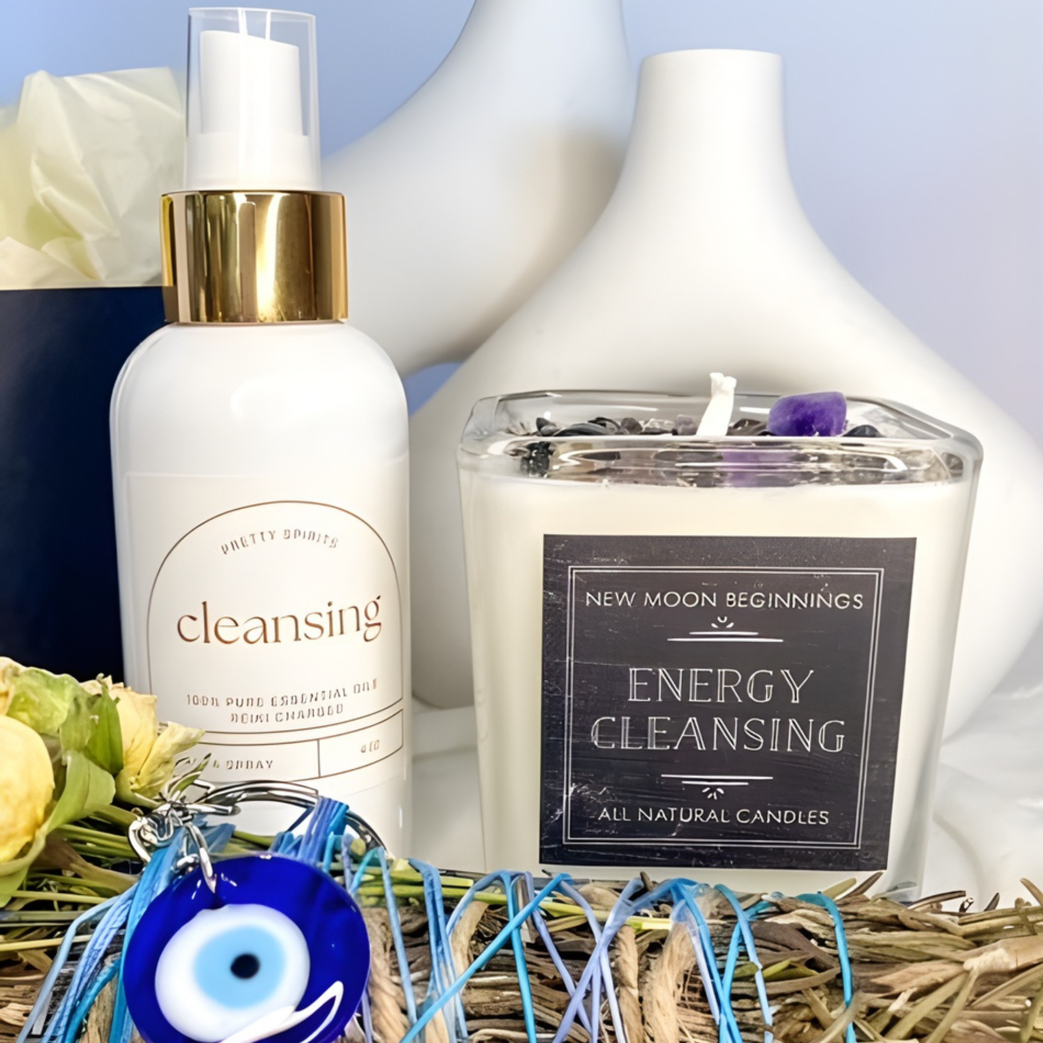 Cleansing products including a bottle, candle, and amulet on a textured surface with a light blue background.