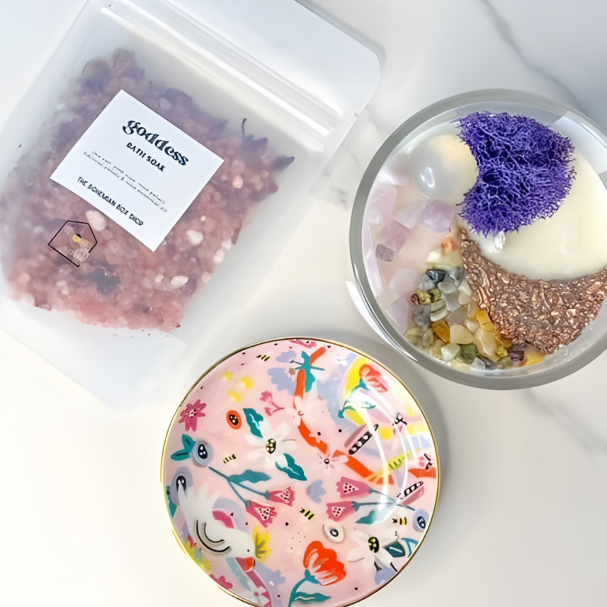 Colorful bath bomb with decorative packaging on a white surface