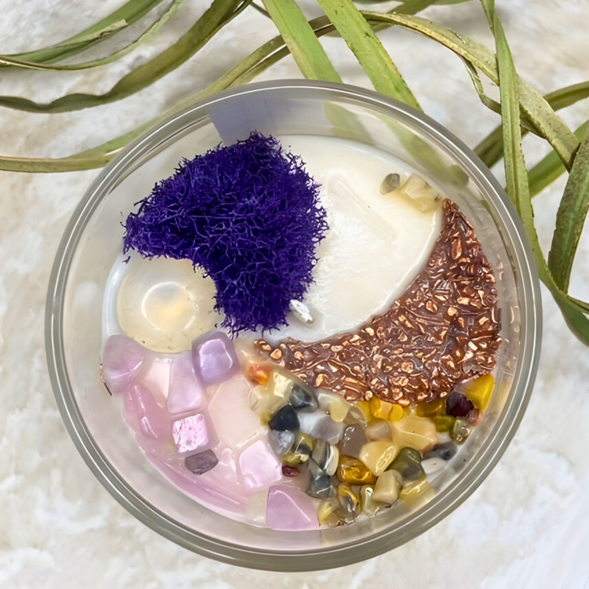 scented candle named cloud nine with crystals and sea cultures