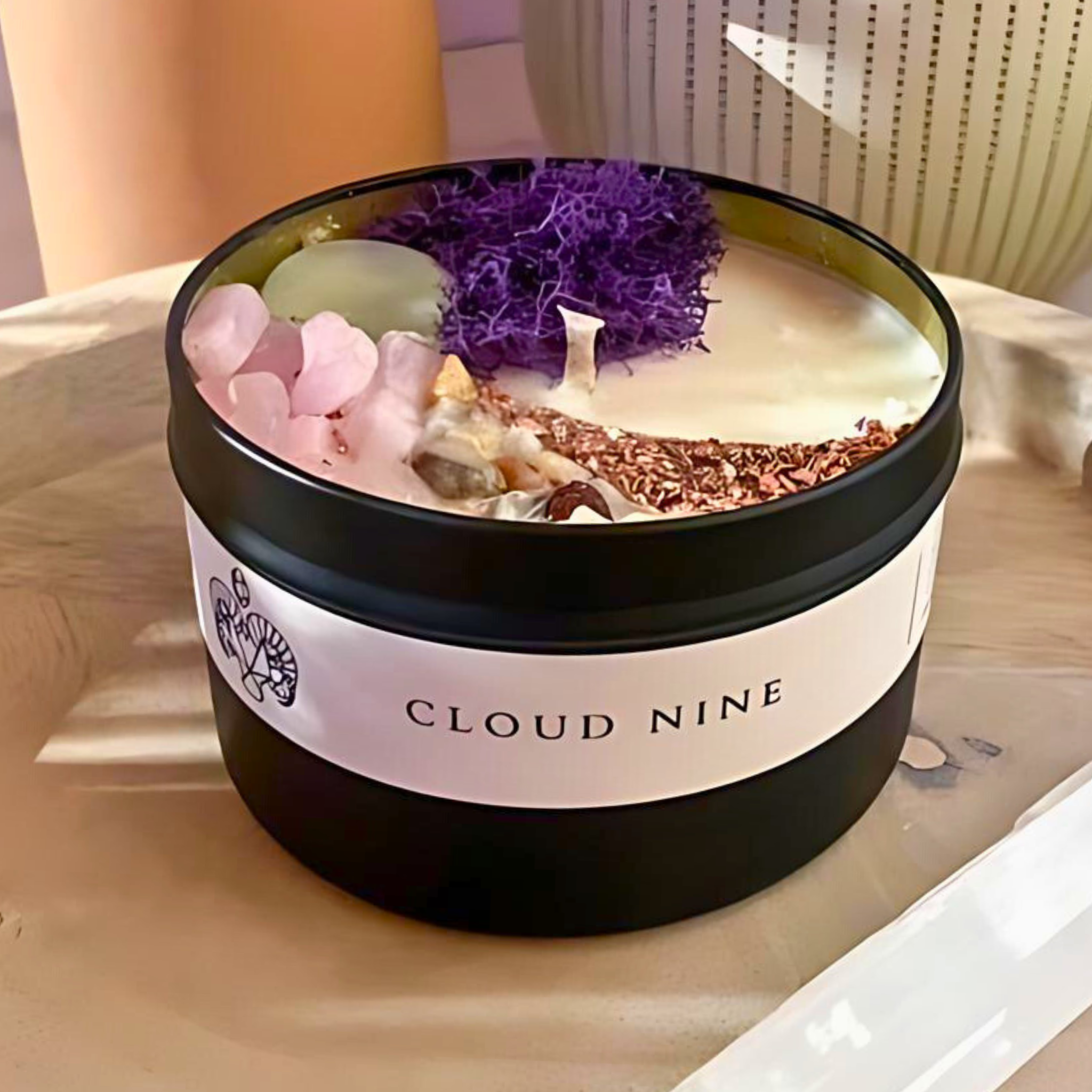 scented candle named cloud nine with crystals and sea cultures