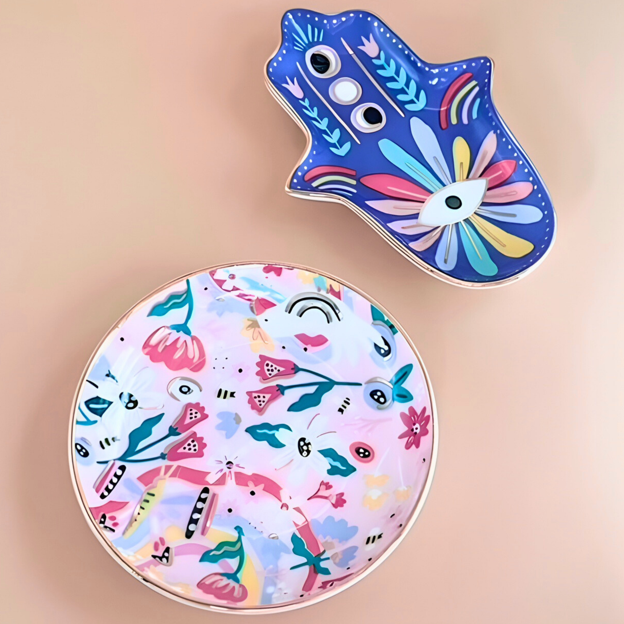 Two colorful coasters with floral and abstract designs on a beige background