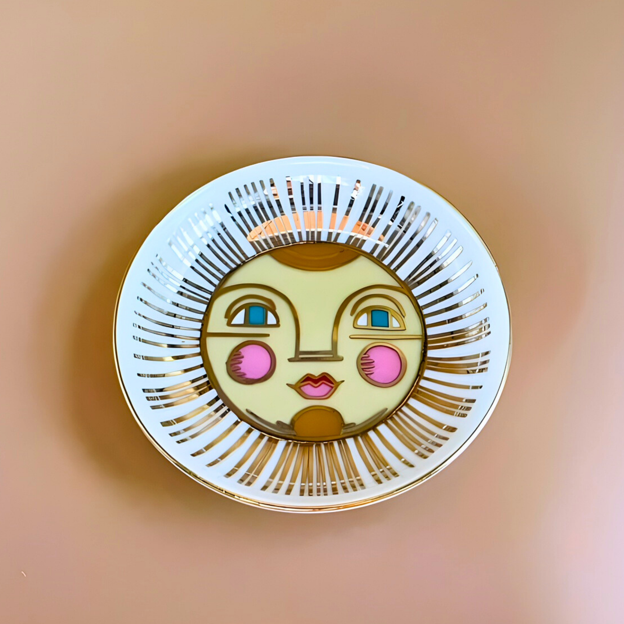 Circular decorative item with a face design on a beige background