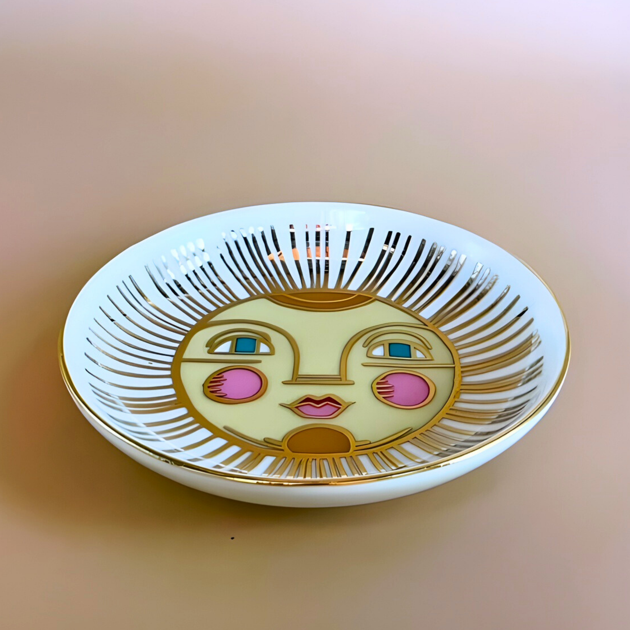 Decorative plate with a sun face design on a gradient background