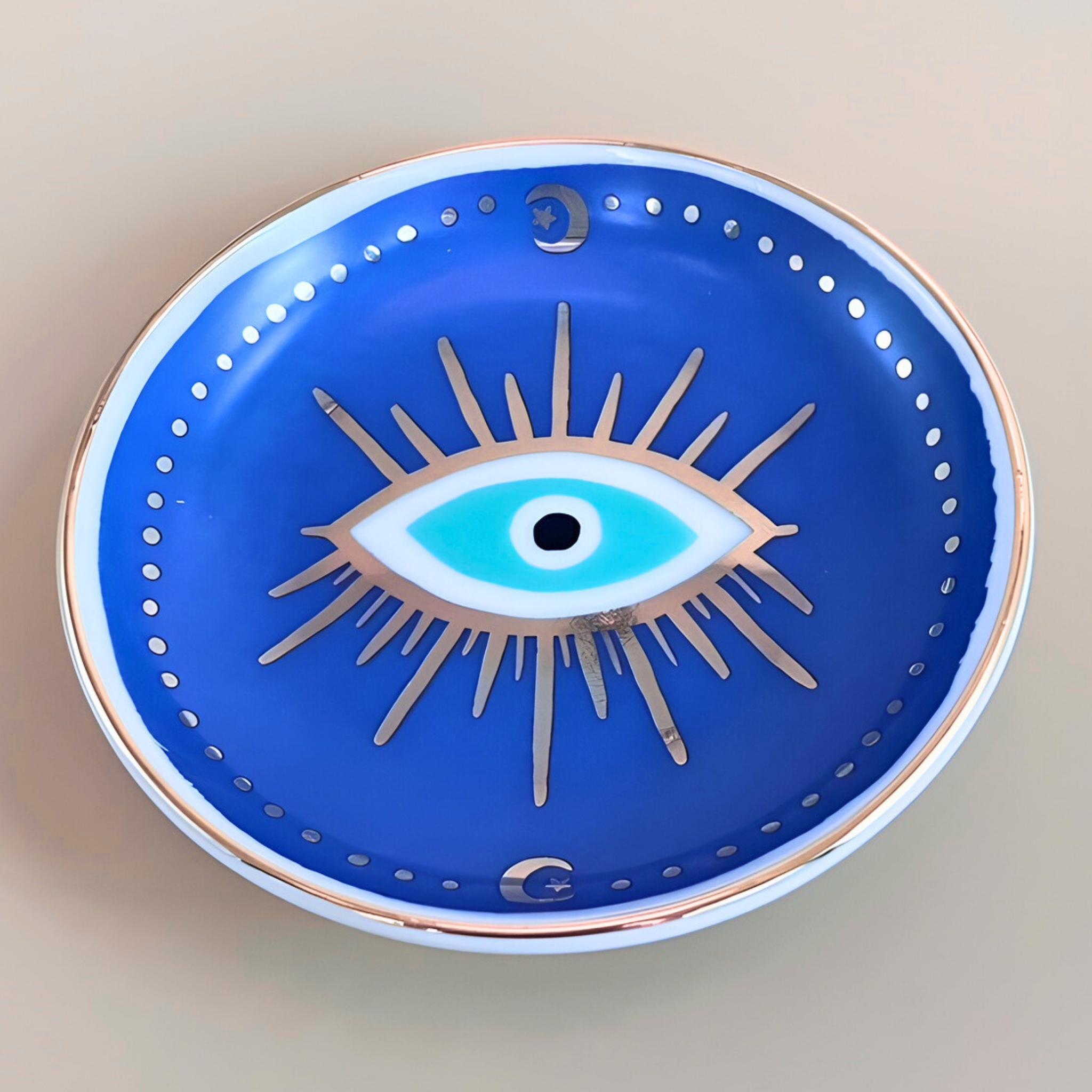 Decorative plate with an eye design on a beige background