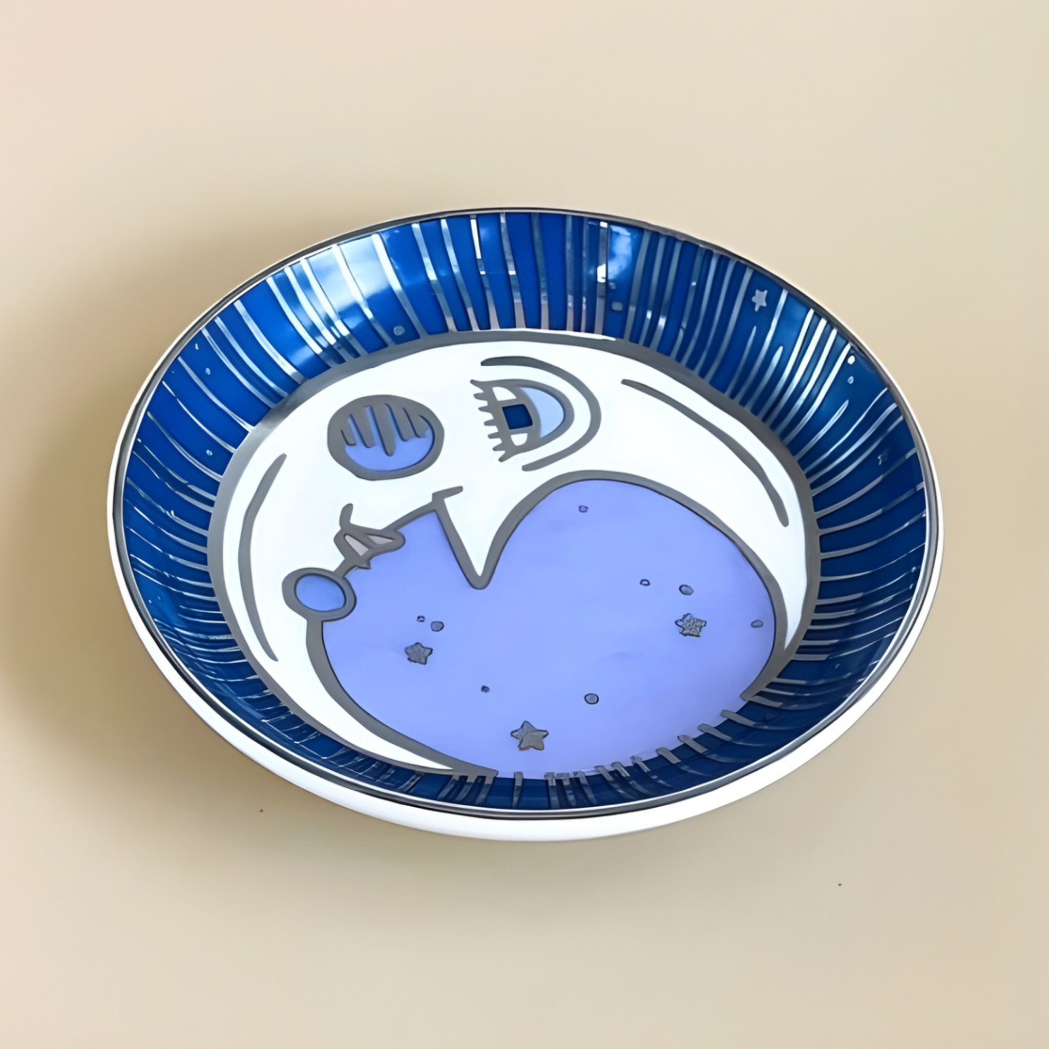 Decorative plate with blue and white design on a beige background