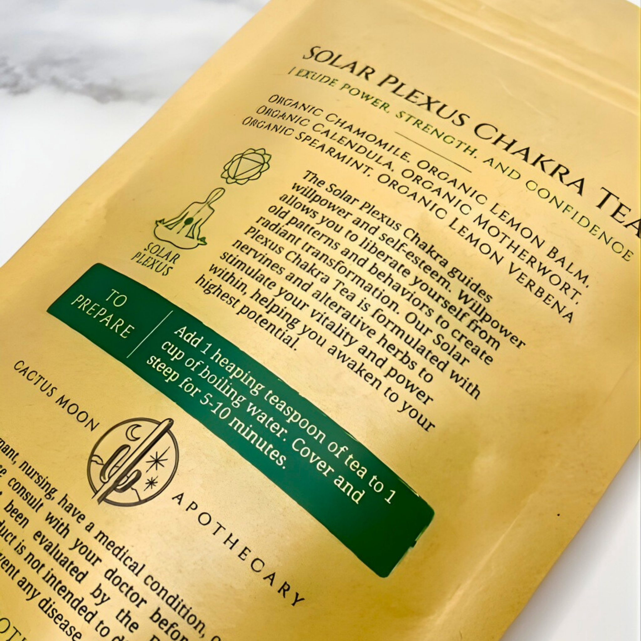 Solar Plexus Chakra Tea package with text and branding on a white background