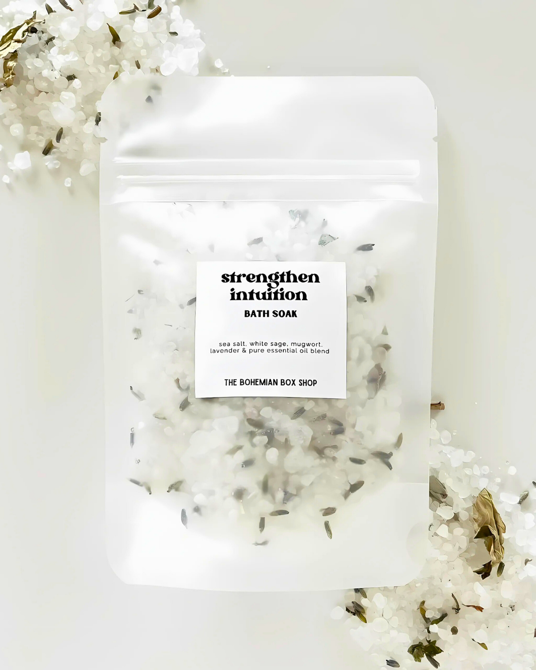 Bath salt package with herbs on a white background