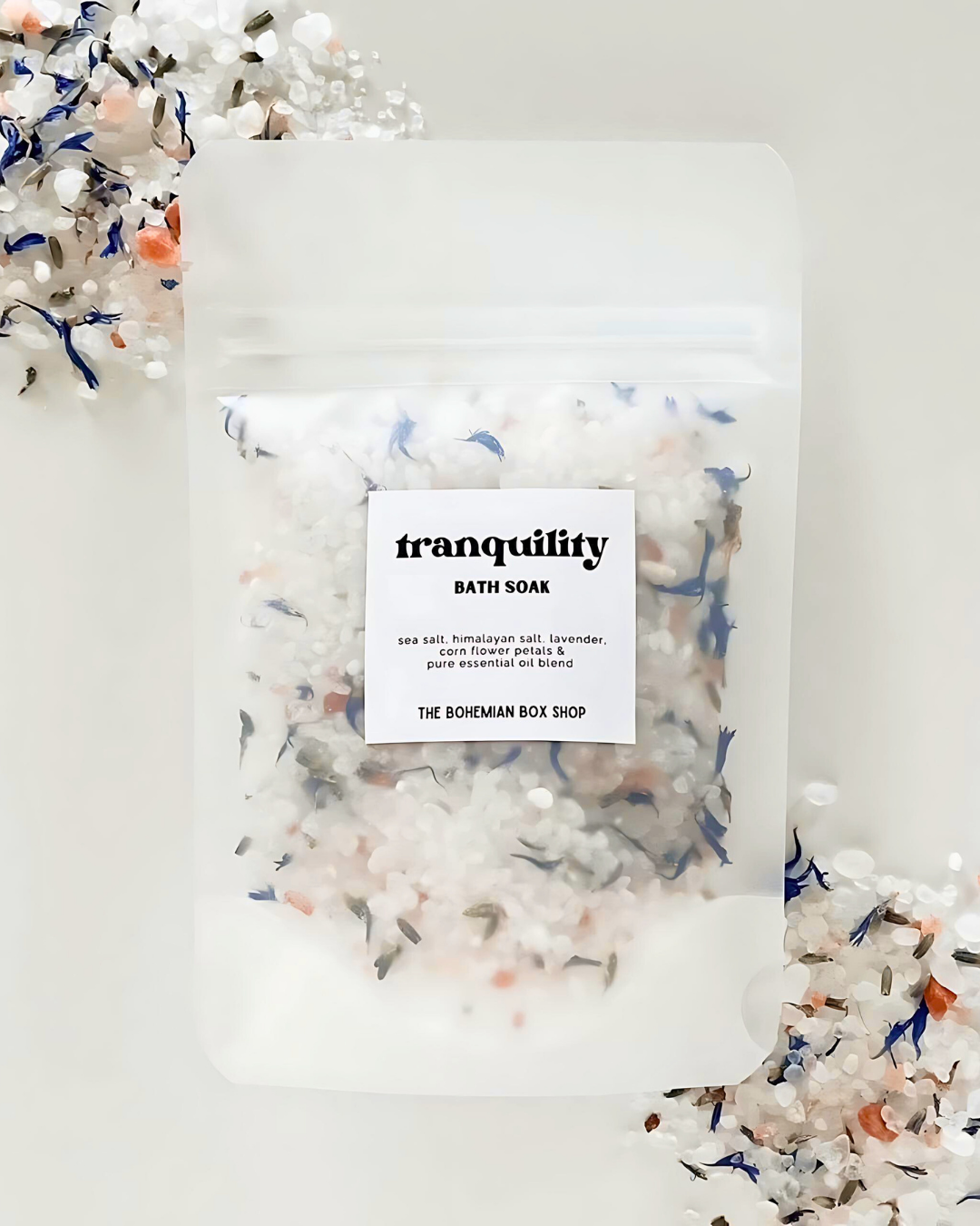 Bath soap package labeled 'tranquility' with decorative elements on a white background