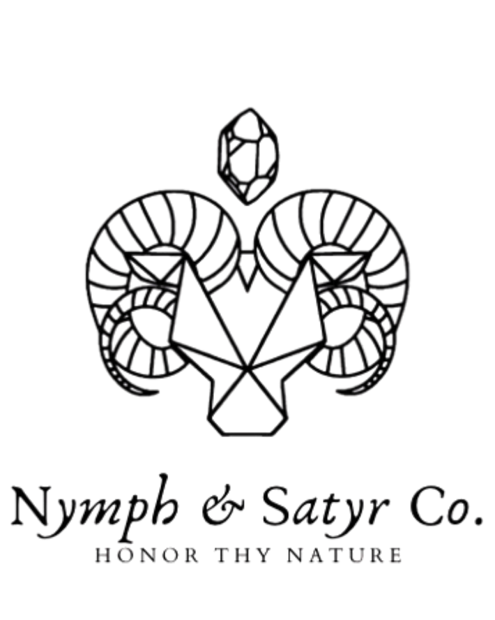 Logo of Nymph & Satyr Co. featuring a stylized ram's head and crystal with the brand name and tagline.